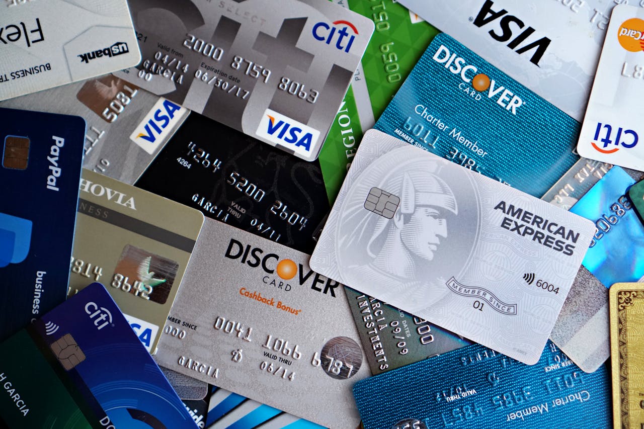 Bunch of credit cards strewn across a table